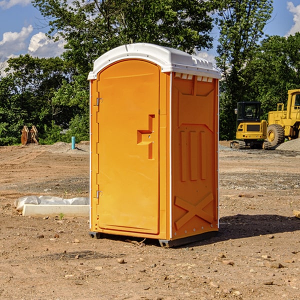 how often are the portable restrooms cleaned and serviced during a rental period in McDade Texas